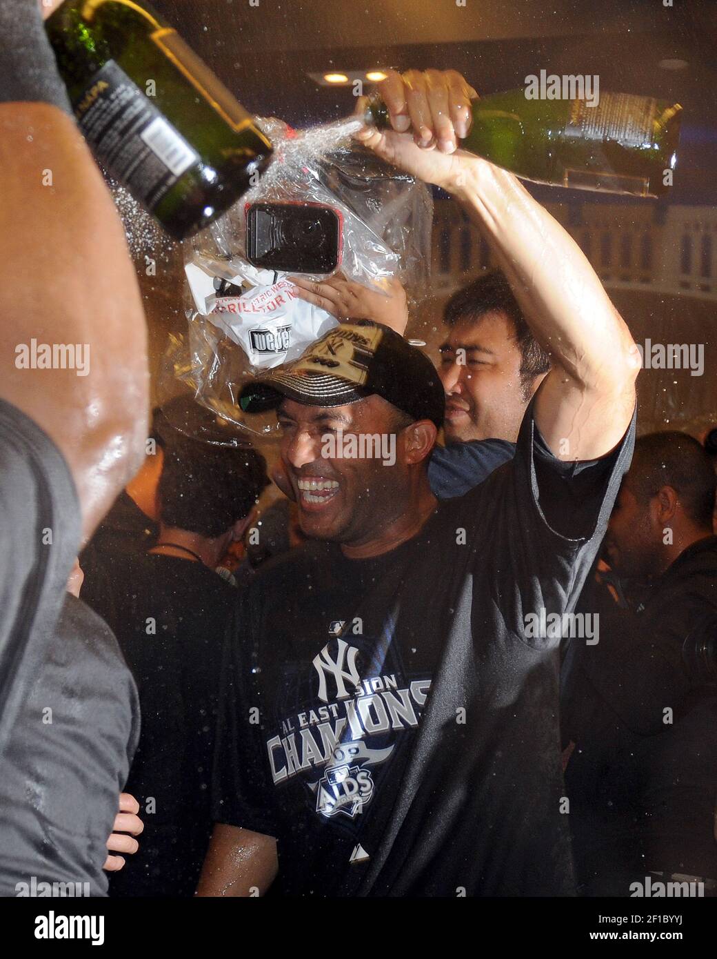 New York Yankees' Mariano Rivera sprays champagne as he celebrates