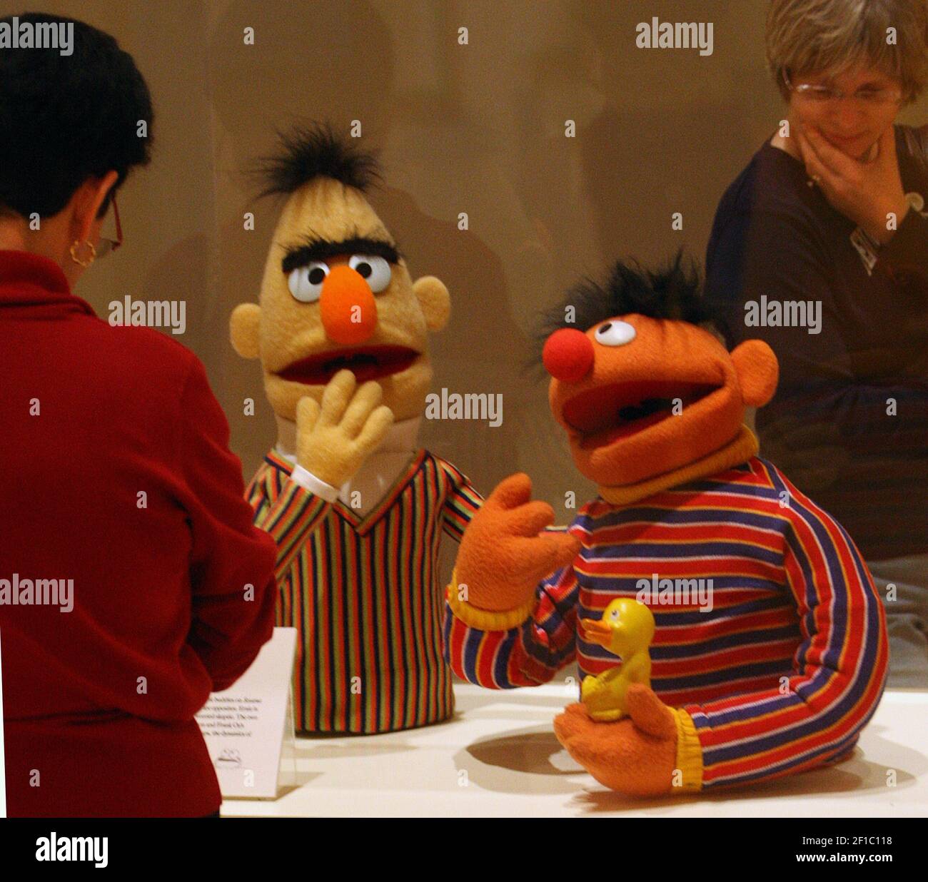 Muppets Bert, left, and Ernie, holding his rubber duckie, seem to have