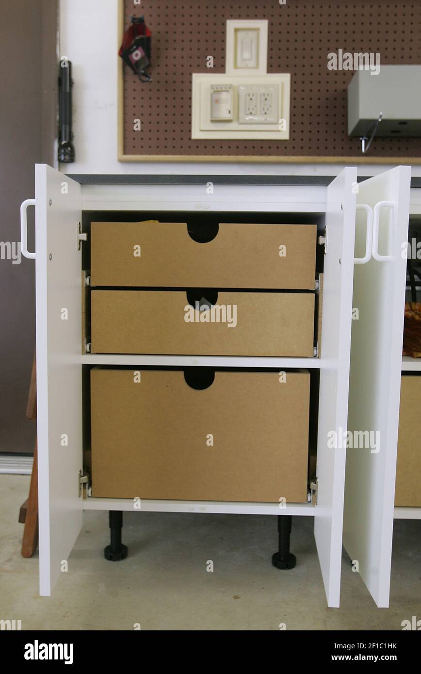 Lots of organized storage is featured in the garage of Mickey and Angie ...