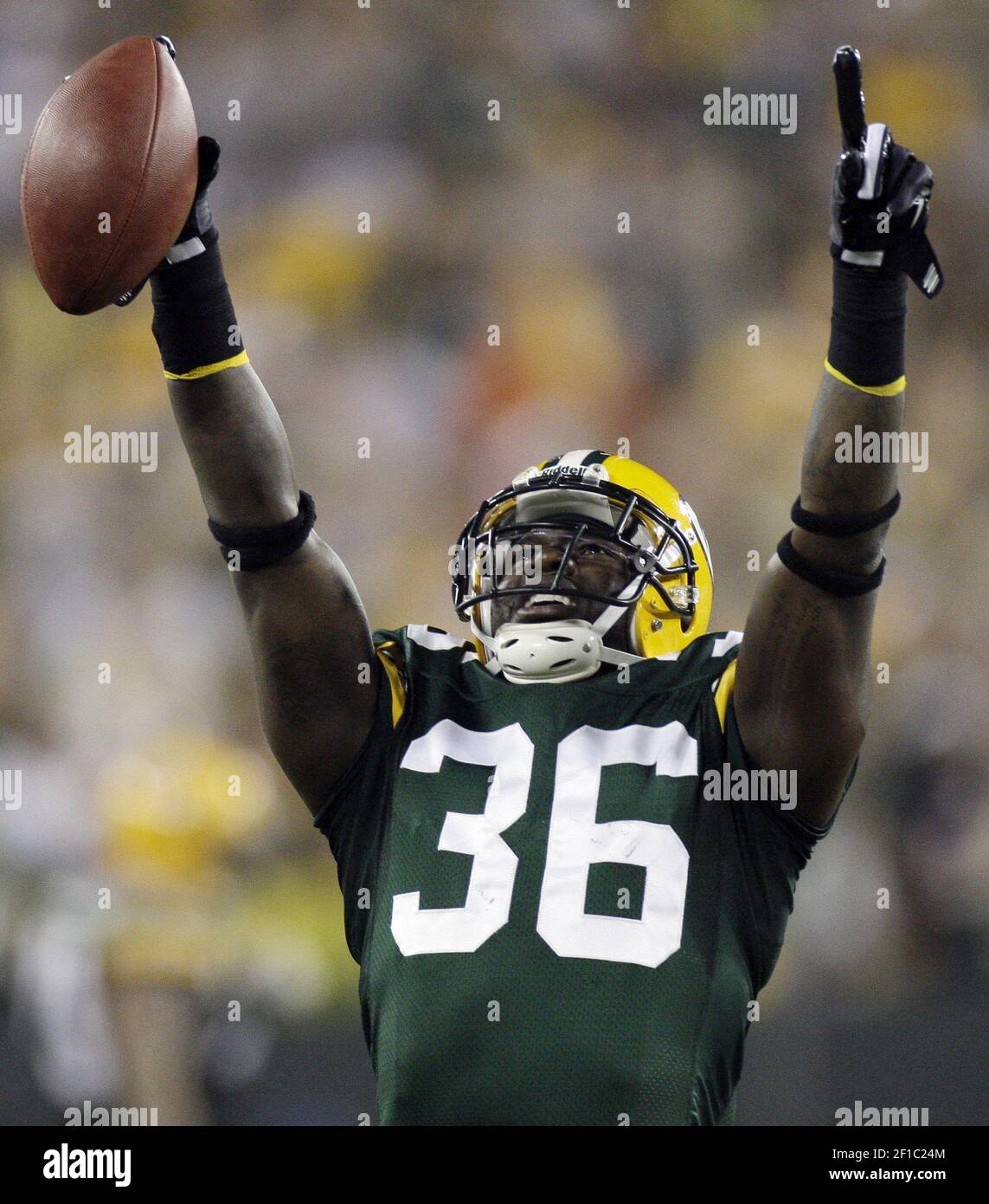 Green Bay Packers safety Nick Collins celebrates his interception of a pass  thrown by Chicago Bears quarterback Jay Cutler in the first quarter at  Lambeau Field in Green Bay, Wisconsin, on Sunday,