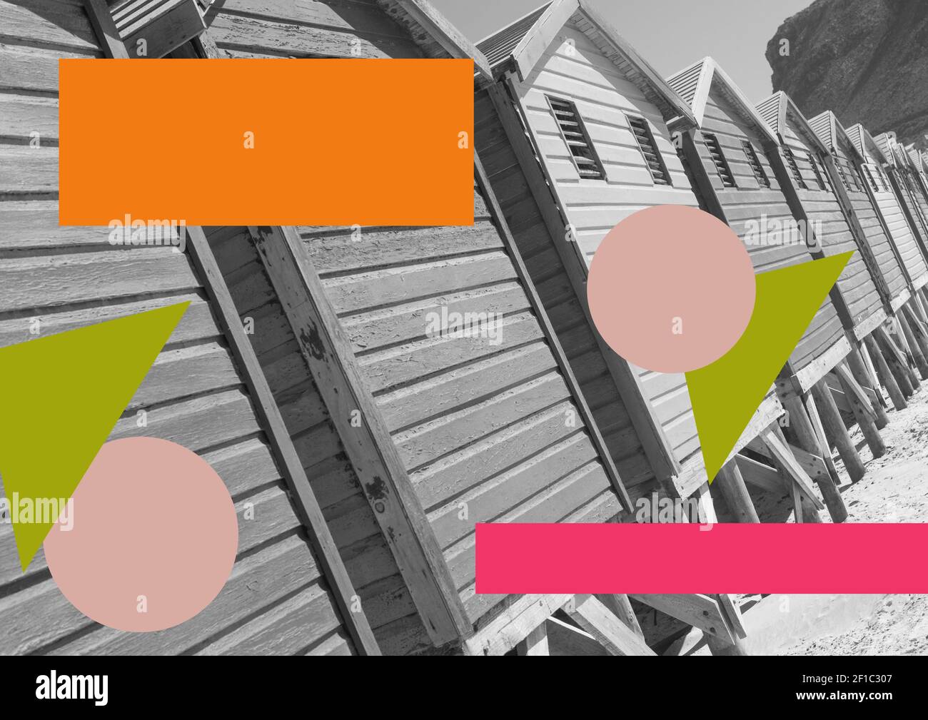 Composition of black and white image of beach huts with colourful geometric shapes Stock Photo