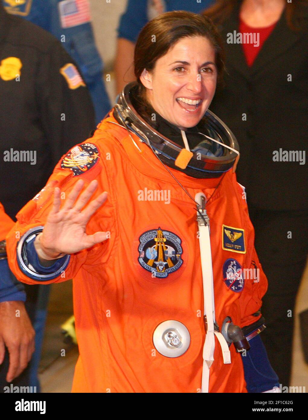 NASA astronaut Nicole Stott leaves the Operations and Checkout building, Monday, August 24, 2009, with six crew mates to board shuttle Discovery on launch pad 39A at the Kennedy Space Center, in Florida. Space shuttle Discovery is poised for launch for a supply mission to the International Space Station scheduled for 1:36 am EST Tuesday, August 25, 2009. (Photo by Red Huber/Orlando Sentinel/MCT/Sipa USA) Stock Photo