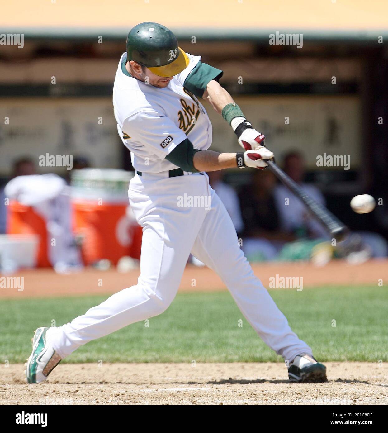 Oakland Athletics designated hitter Nomar Garciaparra connects on a hit  during the sixth inning of a baseball game against the Texas Rangers at  Oakland-Alameda County Coliseum in Oakland, California, on Thursday, August