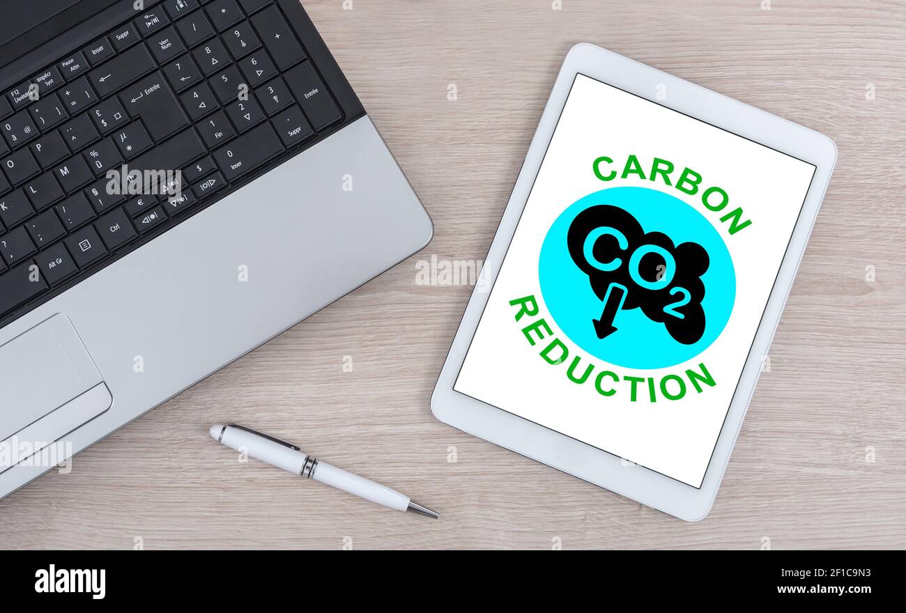 Carbon reduction concept shown on a digital tablet Stock Photo