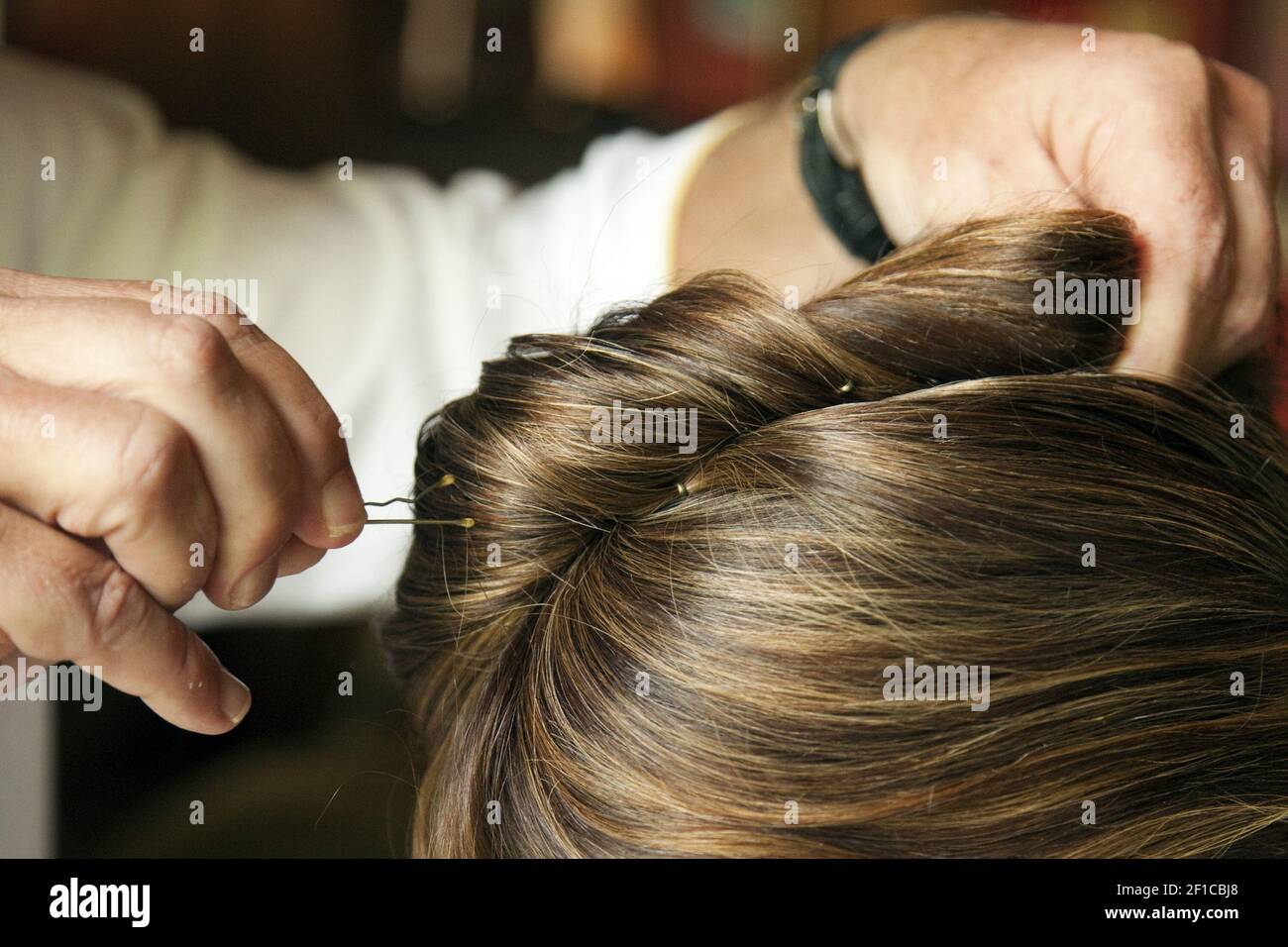 If your hair is making you hot, try a quick and easy hairstyle. Twist