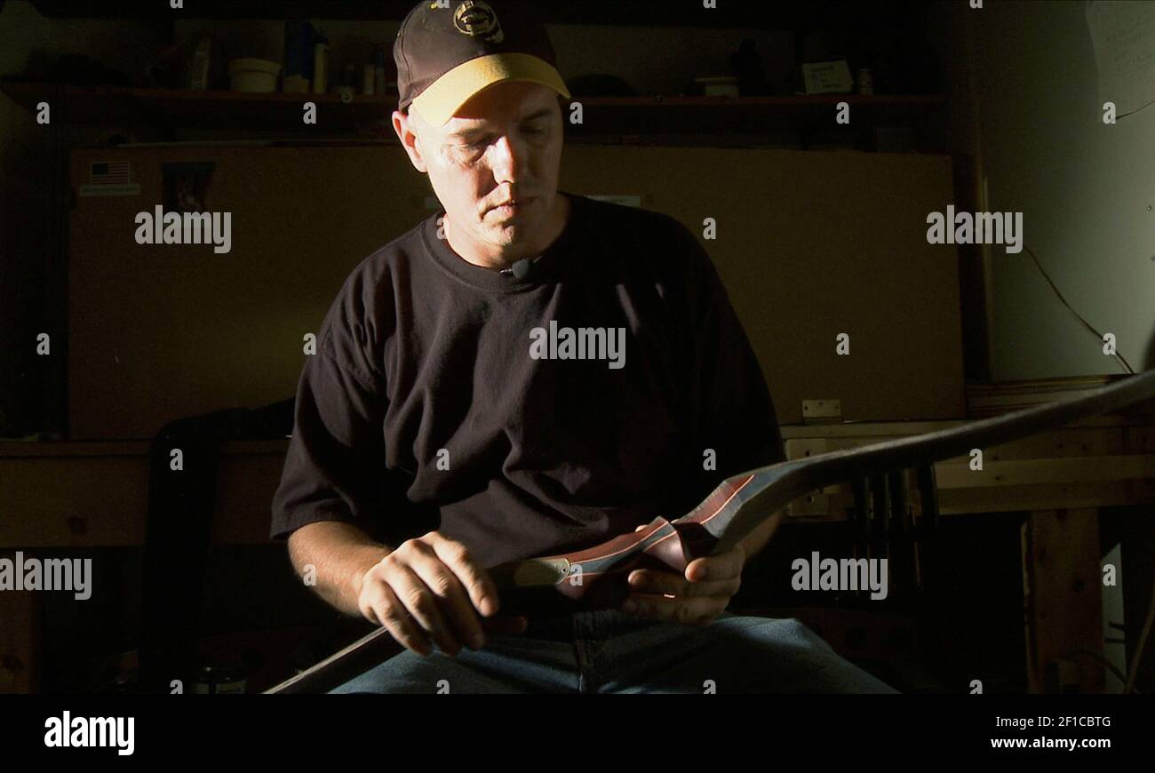 Dave Beeler makes traditional bows in the basement of his home in