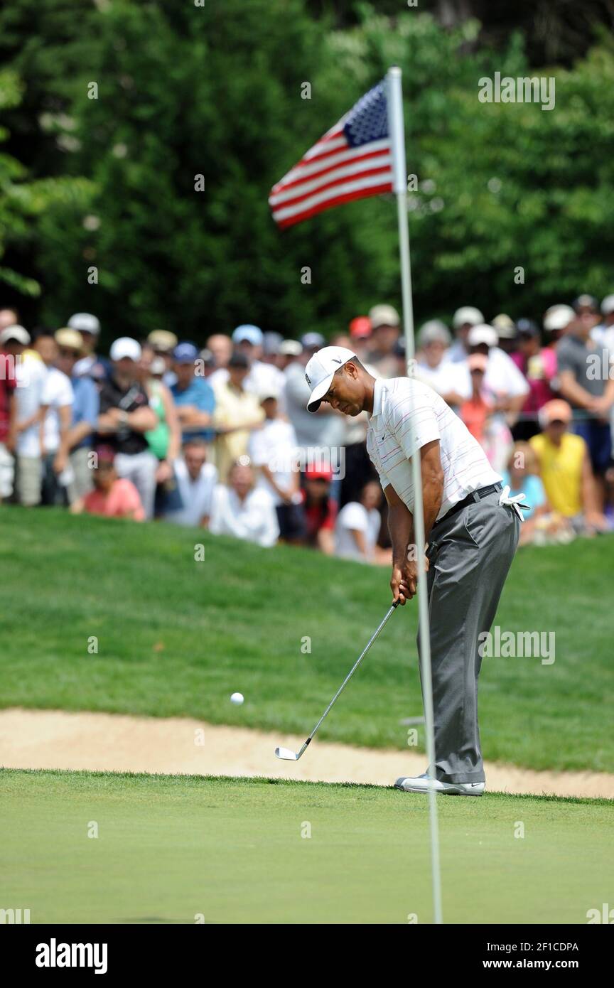 Tiger Woods chips from the rough on the second hole during the third round of the 2009 AT&T National golf tournament at Congressional Country Club in Bethesda, Maryland, Saturday, July 4, 2009. (Photo by James Lang/MCT/Sipa USA) Stock Photo