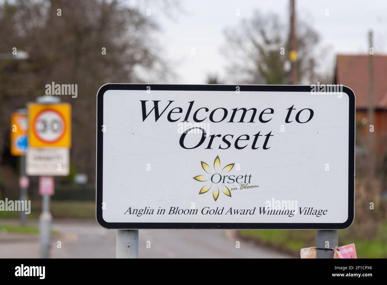 to Orsett road sign in Orsett, Essex, UK. Anglia in bloom gold