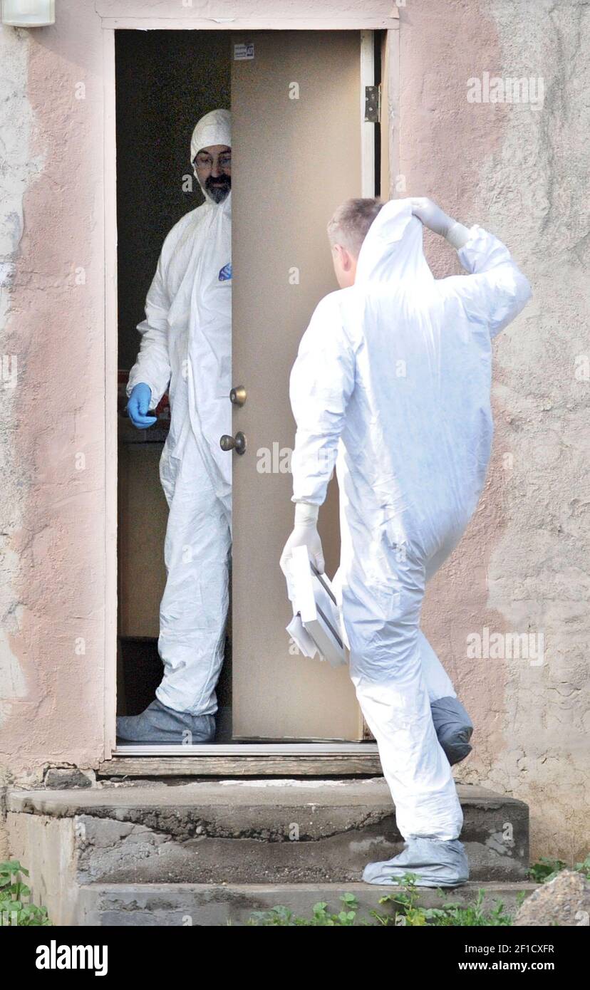 Members of the FBI get ready to look for evidence in connection to the murder of 8-year-old Sandra Cantu at the Clover Road Baptist Church in Tracy California, on April 7, 2009. Sandra went missing on March 27. Her body was discovered Monday stuffed inside a large black suitcase submerged in a pond north of Tracy. (Photo by Doug Duran/Contra Costa Times/MCT/Sipa USA) Stock Photo