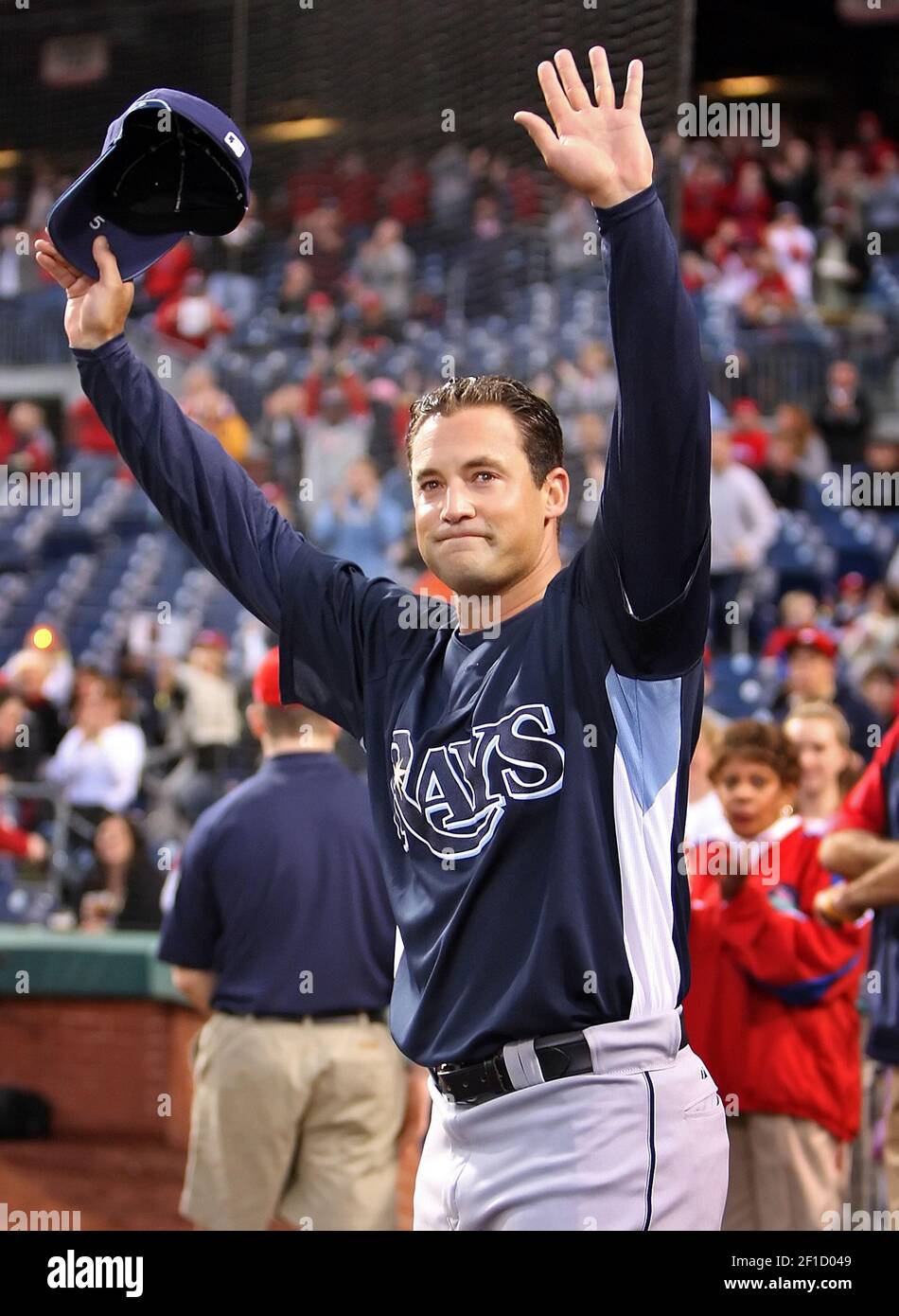 Tampa Bay Rays left fielder Pat Burrell waves to the fans after a special  video presentation on the big screen to honor him as a former Phillies'  player before the Rays' preseason