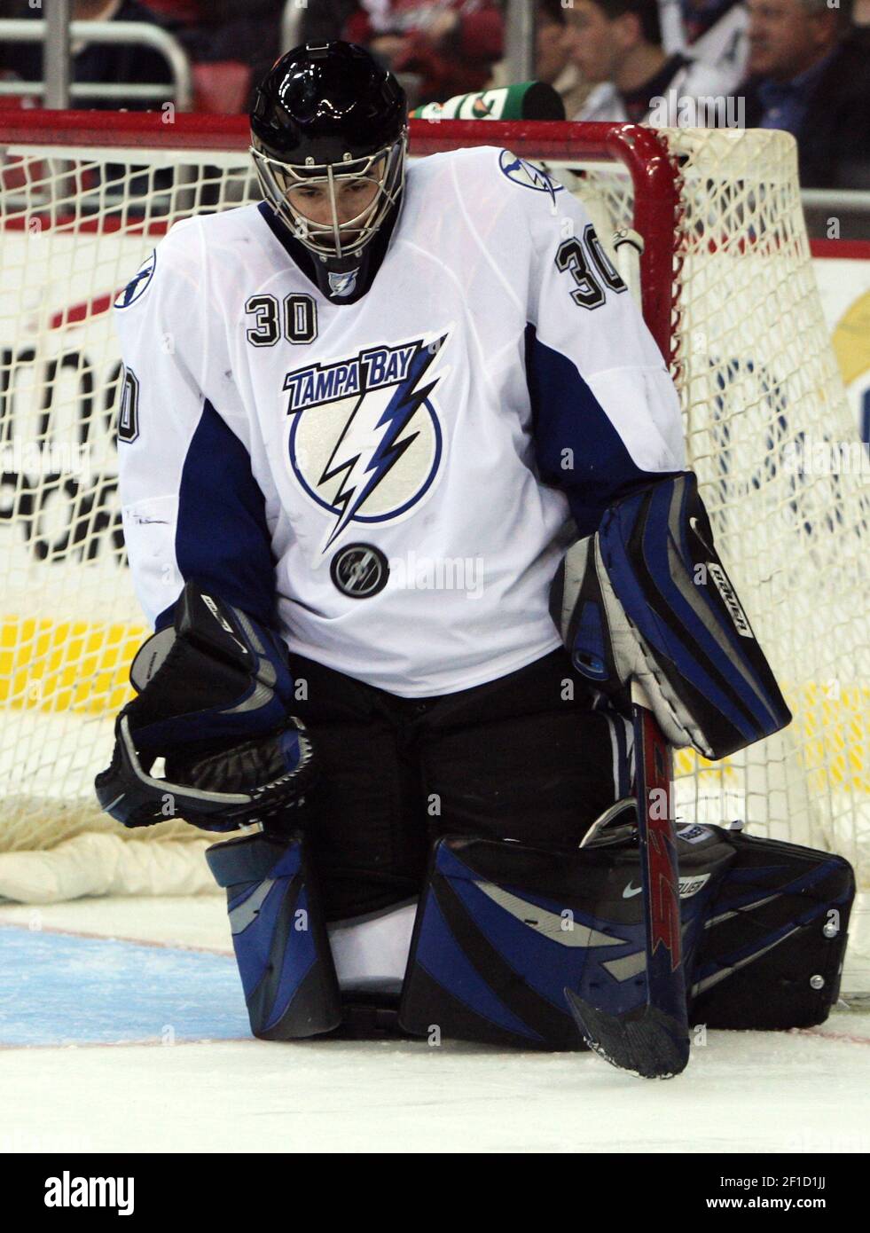 Goalie Mike McKenna of the Tampa Bay Lightning knocks down a shot by