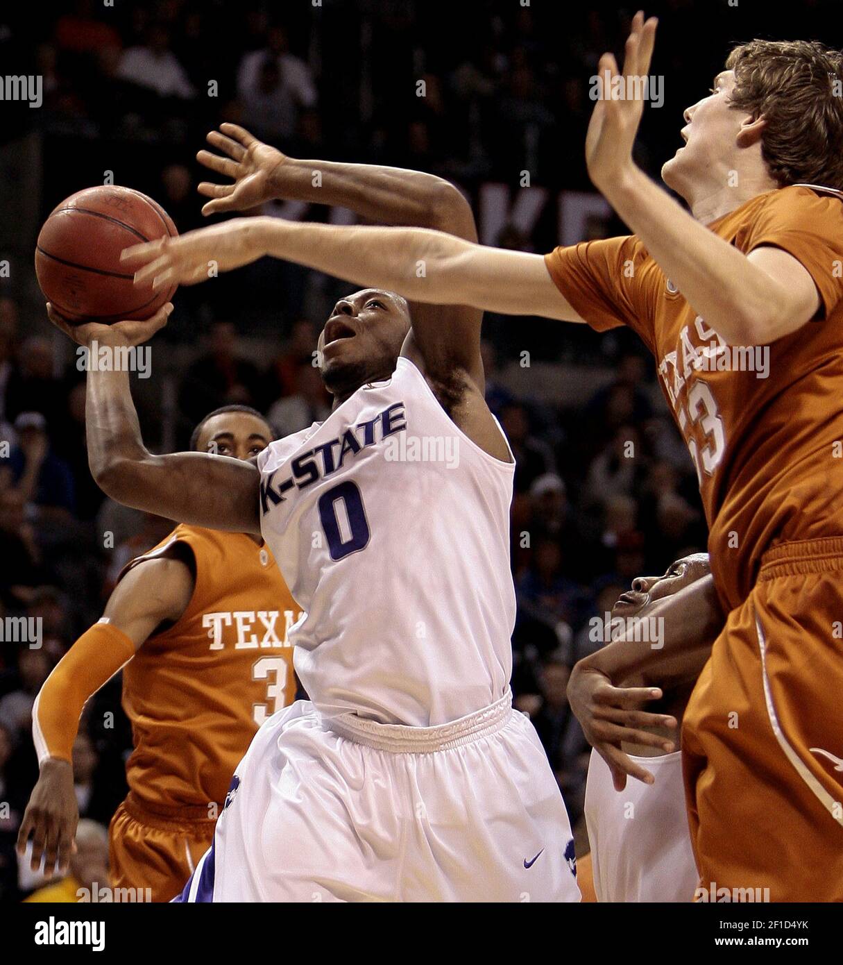 Kansas State guard Jacob Pullen (0) made a basket and was fouled in the