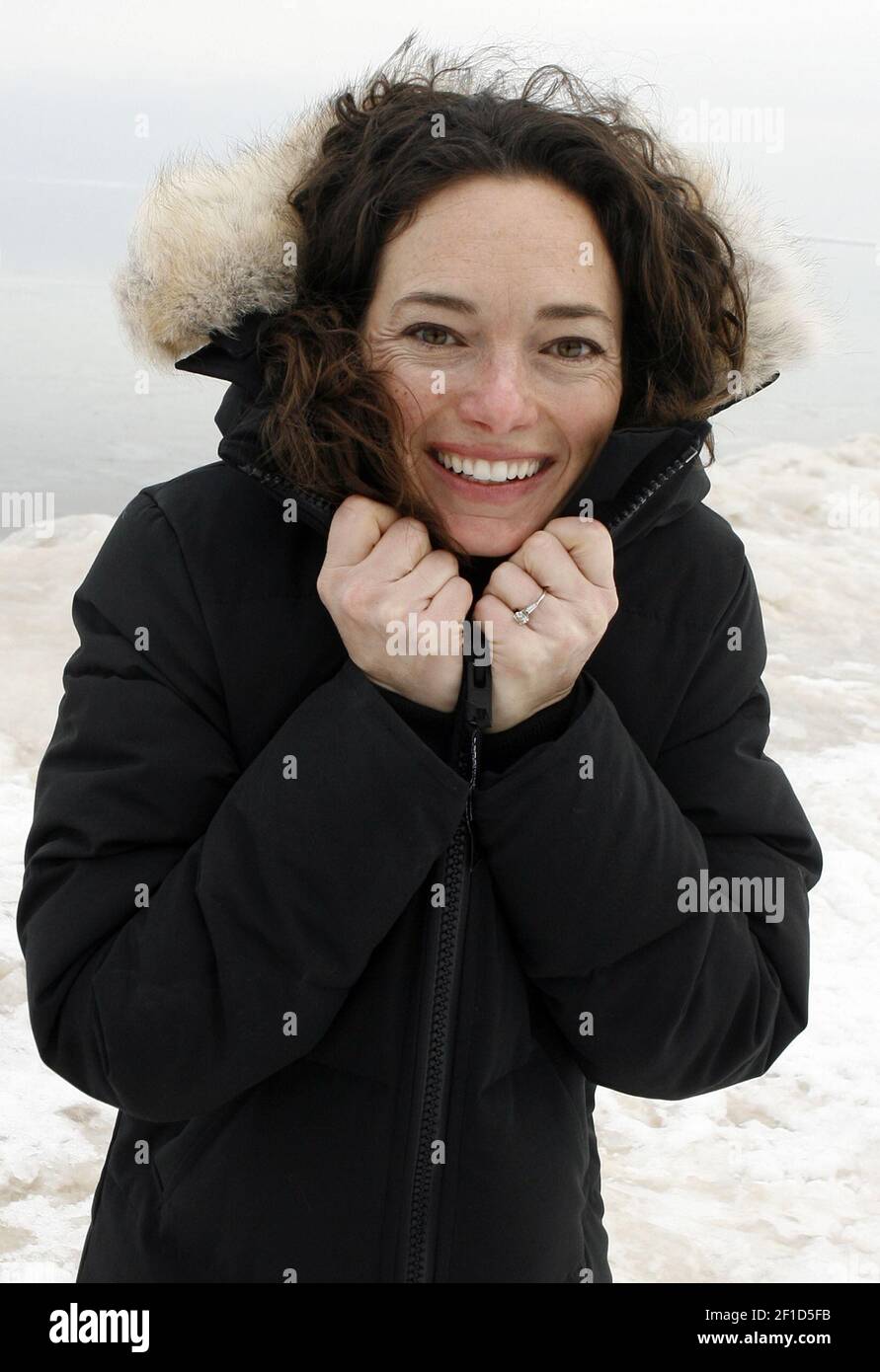 Colleen Mastony, a Chicago Tribune reporter, models her choice for the  warmest coat -- the Canada Goose Mystique Parka ($625) -- along the lake at  Oak Street Beach in Chicago. (Photo by