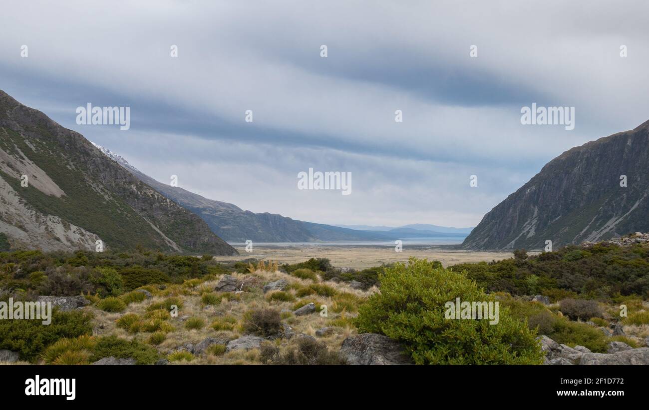 Vista on alpine valley with cloudy skies. Shot at Aoraki/Mt Cook National Park, New Zealand Stock Photo