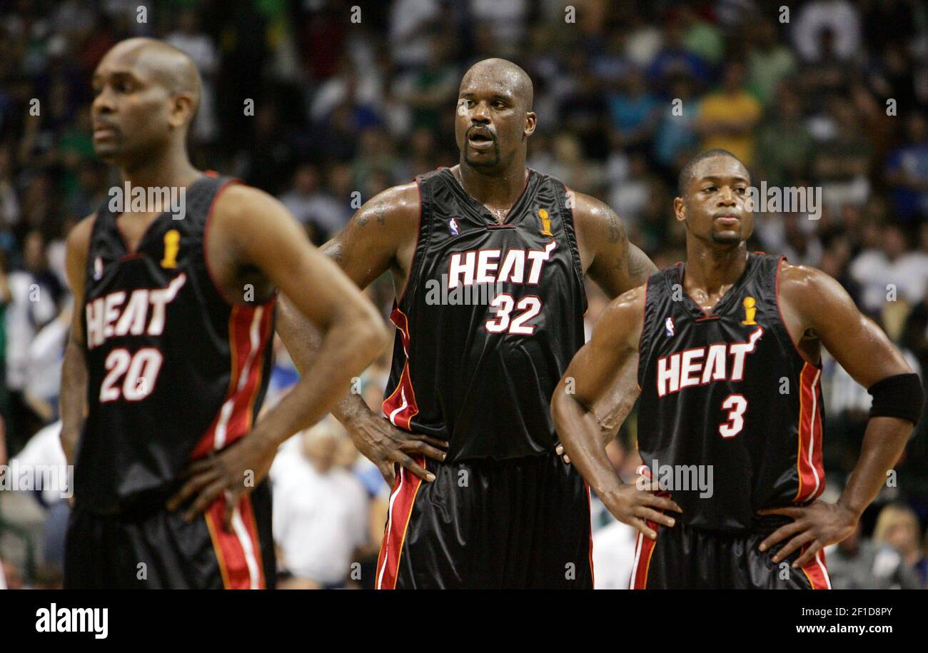 Miami Heat players Gary Payton (left), Shaquille O'Neal and