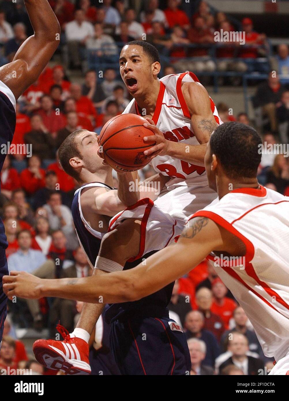 Krt Sports Story Slugged Richmond Wisconsin Krt Photograph By David Joles Milwaukee Journal Sentinel Wisconsin And Chicago Out Until 4 2 04 March 19 Milwaukee Wi University Of Wisconsin S Devin Harris Drives The Lane Against