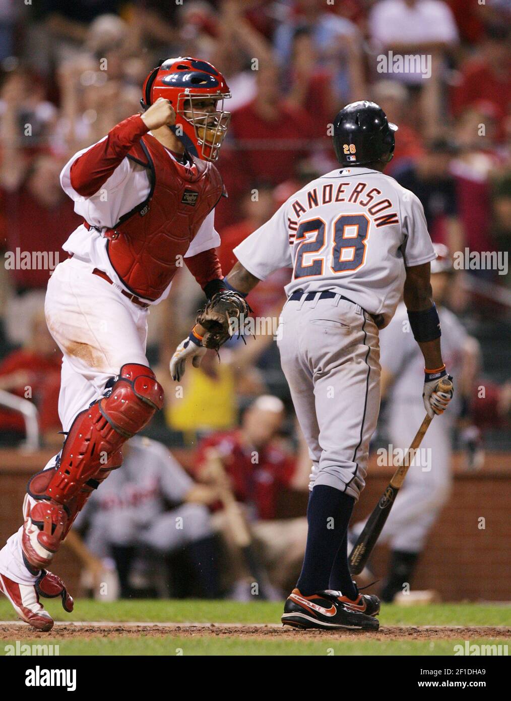 St. Louis Cardinals catcher Yadier Molina (left) celebrates the final