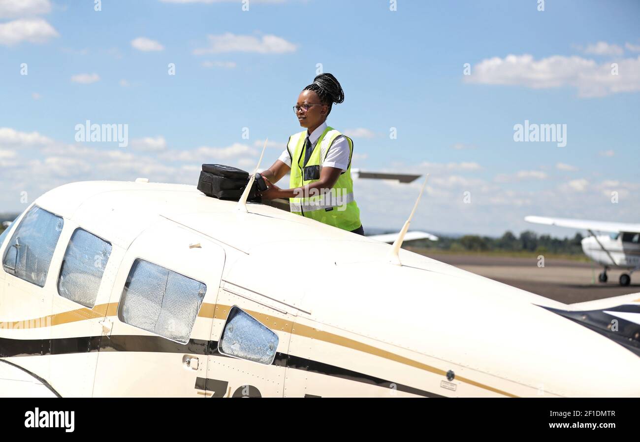 refilwe ledwaba a pilot training young african women to become aircraft and drone pilots looks on after an interview at the grand central airport in midrand south africa february 28 2021 picture taken february 28 2021 reuterssiphiwe sibeko 2F1DMTR
