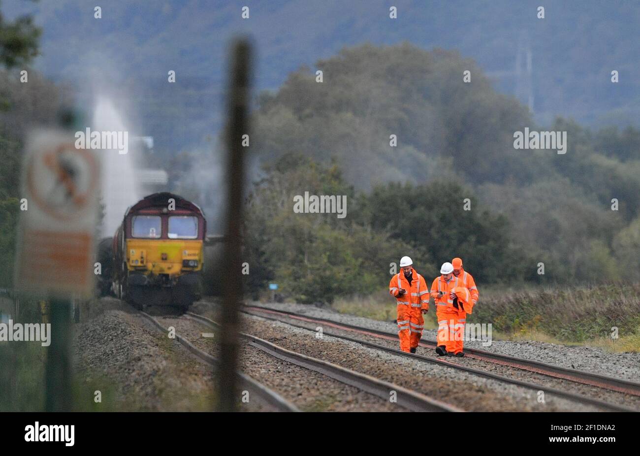 File photo dated 27/08/20 of workers at the scene of a derailed diesel