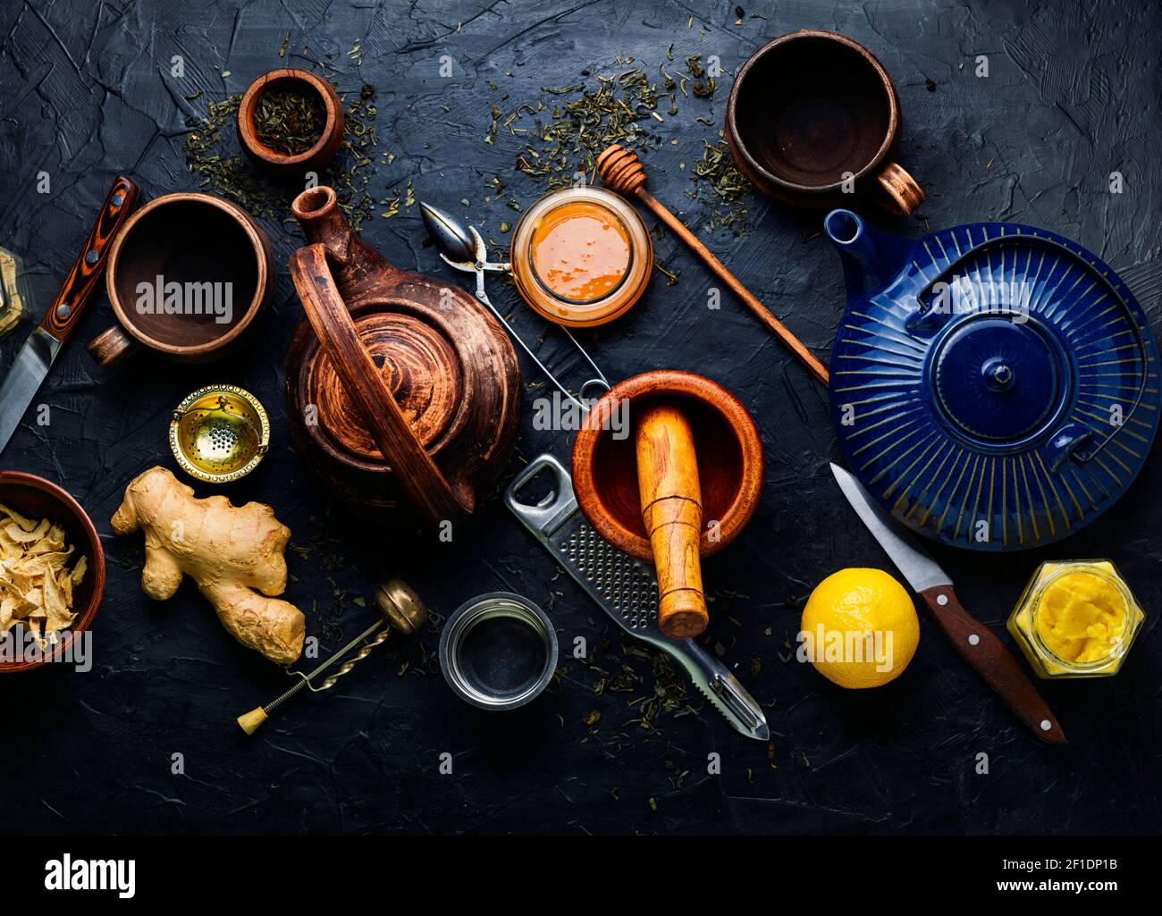 Teapot with ginger tea and honey.Vitamin,healing tea.Healthy ginger tea