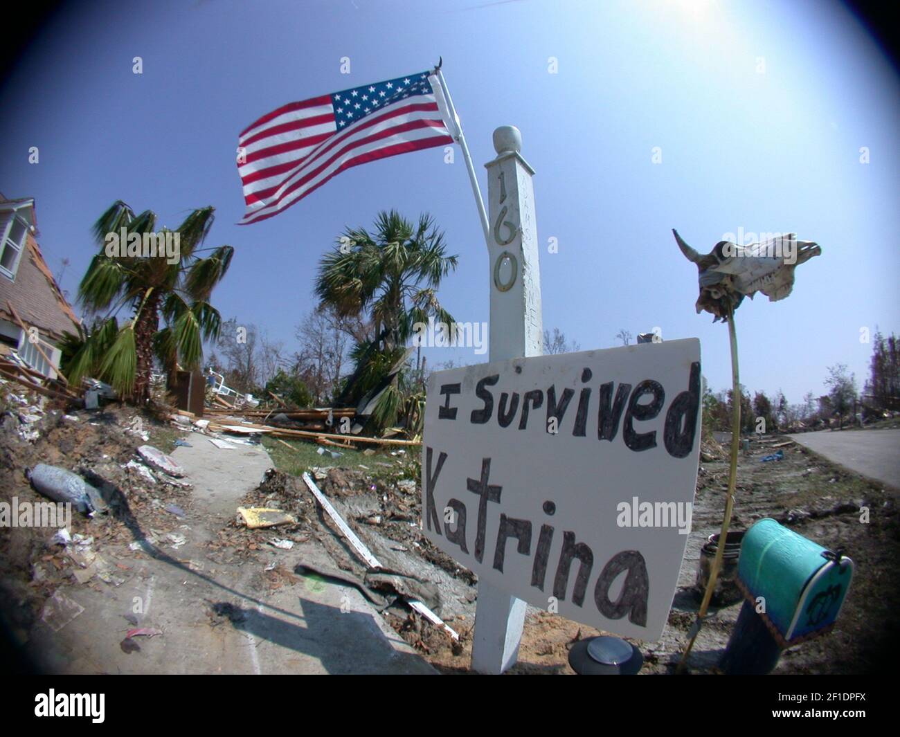 A sign saying 'I Survived Katrina' stands outside of a home in Waveland, Miss., that was destroyed by Hurricane Katrina. Ten years after the storm, South Mississippi is still in the process of rebuilding. (Photo by Suzy Mast/Biloxi Sun Herald/TNS) *** Please Use Credit from Credit Field *** Stock Photo