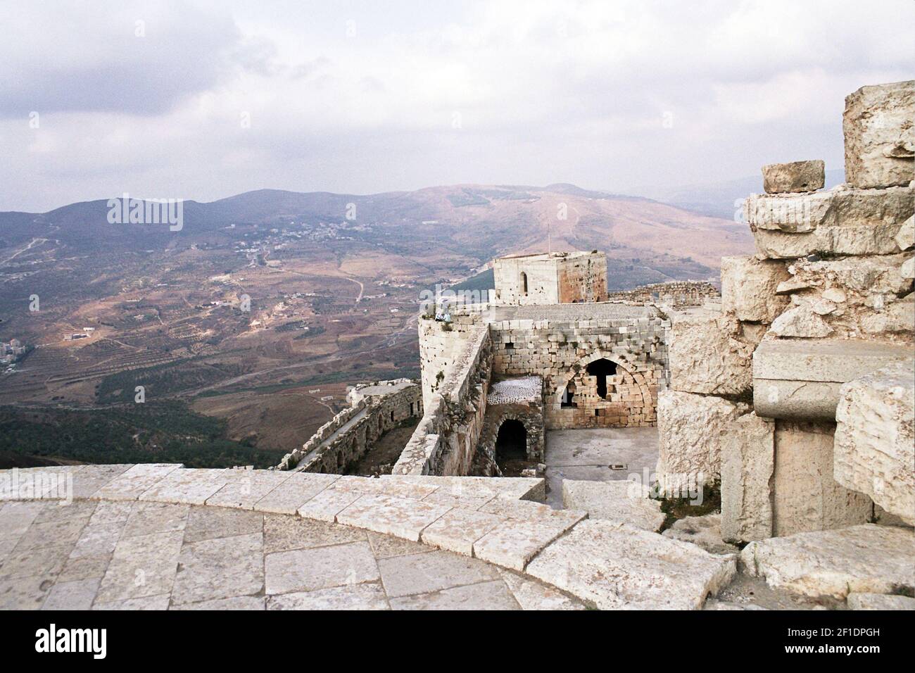 View from the cruisader castle of Krak des Chevaliers, Syria. Ancient monuments across Syria are under threat as a result of the civil war which began in 2011. Temples in the Roman city of Palmyra have been attacked by Islamic State, while other sites have suffered shelling from government forces and been stripped by looters. (Photo by Dominic Dudley / Pacific Press) *** Please Use Credit from Credit Field *** Stock Photo