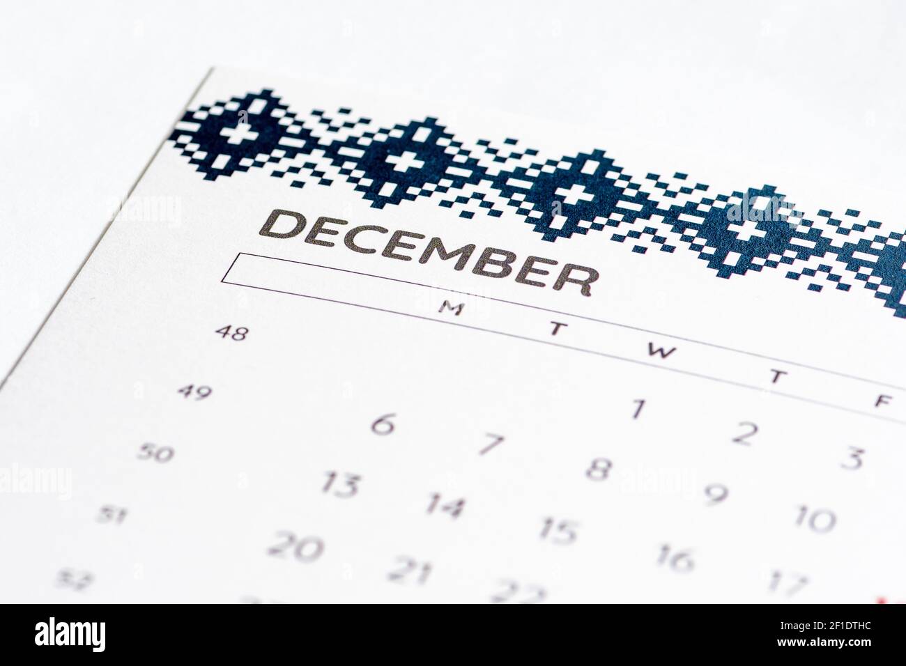 Month of December on the calendar on a white table with days, close up Stock Photo