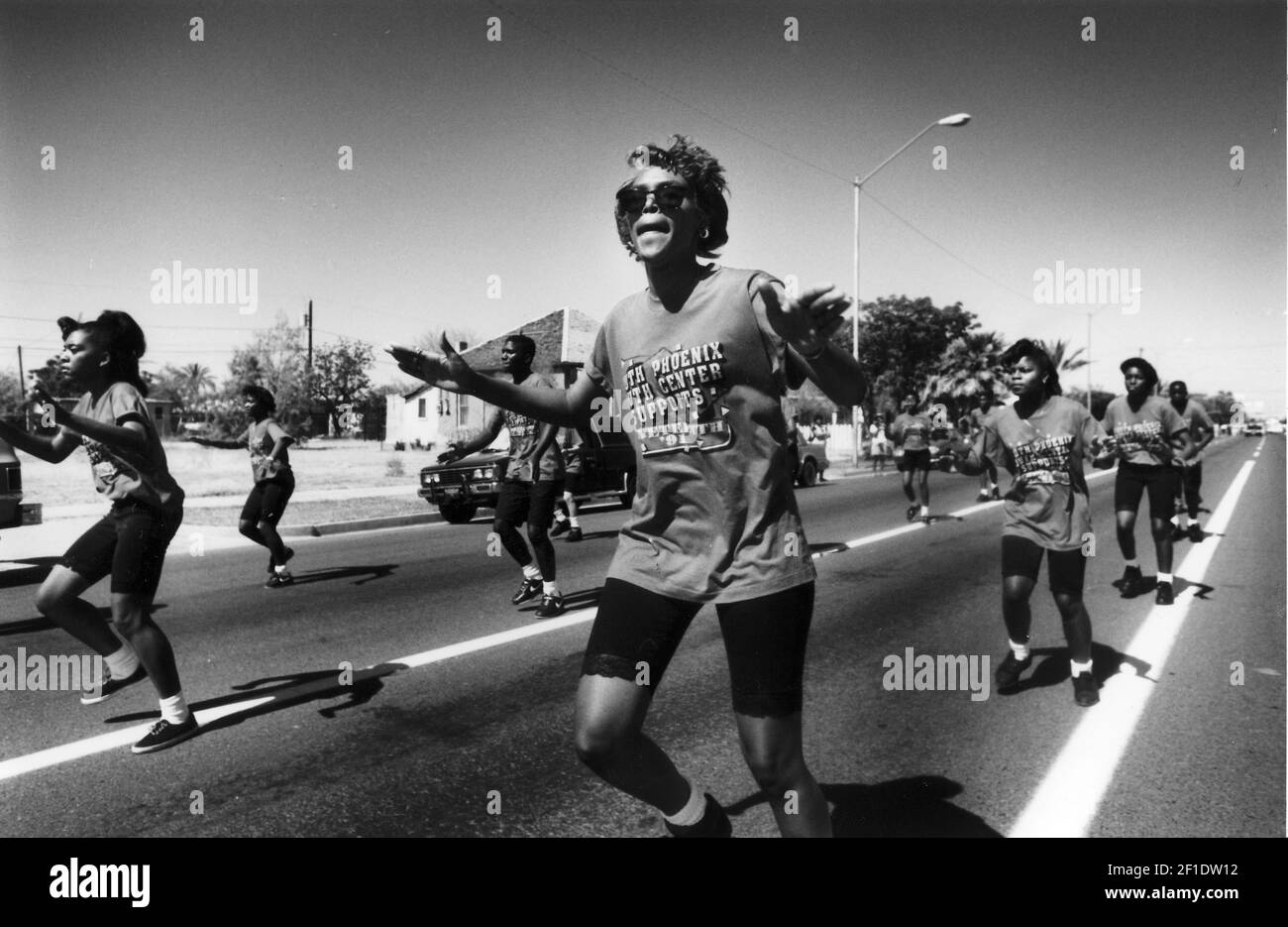 1991: Juneteenth Parade, Sherilyn Dean (foreground) leads the So. Mountain Touth Center Drill Team. Juneteenth is celebrated as a commemoration of the ending of slavery in the United States. On June 19, 1865 Union soldiers, led by Major General Gordon Granger, arrived in Galveston, TX to spread the news that the war had ended and that the enslaved were now free. The announcement came two year after President Abraham Lincoln’s Emancipation Proclamation given on January 1, 1983, which was not enforced in Texas due to a lack of Union Troops in the area. (Photo by Suzanne Starr/The Republic/USA To Stock Photo