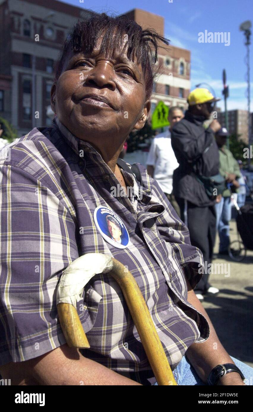 July 30, 2001; Harlem, NY, USA; Enid Wellington waits for the festivities to begin outside the Adam Clayton Powell building where a welcoming party took place for former president Bill Clinton. Mandatory Credit: Danielle P. Richards/The Record via USA TODAY NETWORK/Sipa USA Stock Photo