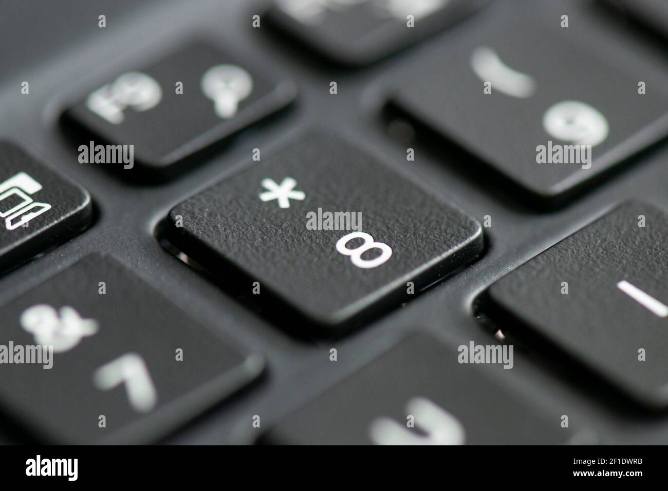 8 and asterisk key on a laptop keyboard Stock Photo - Alamy