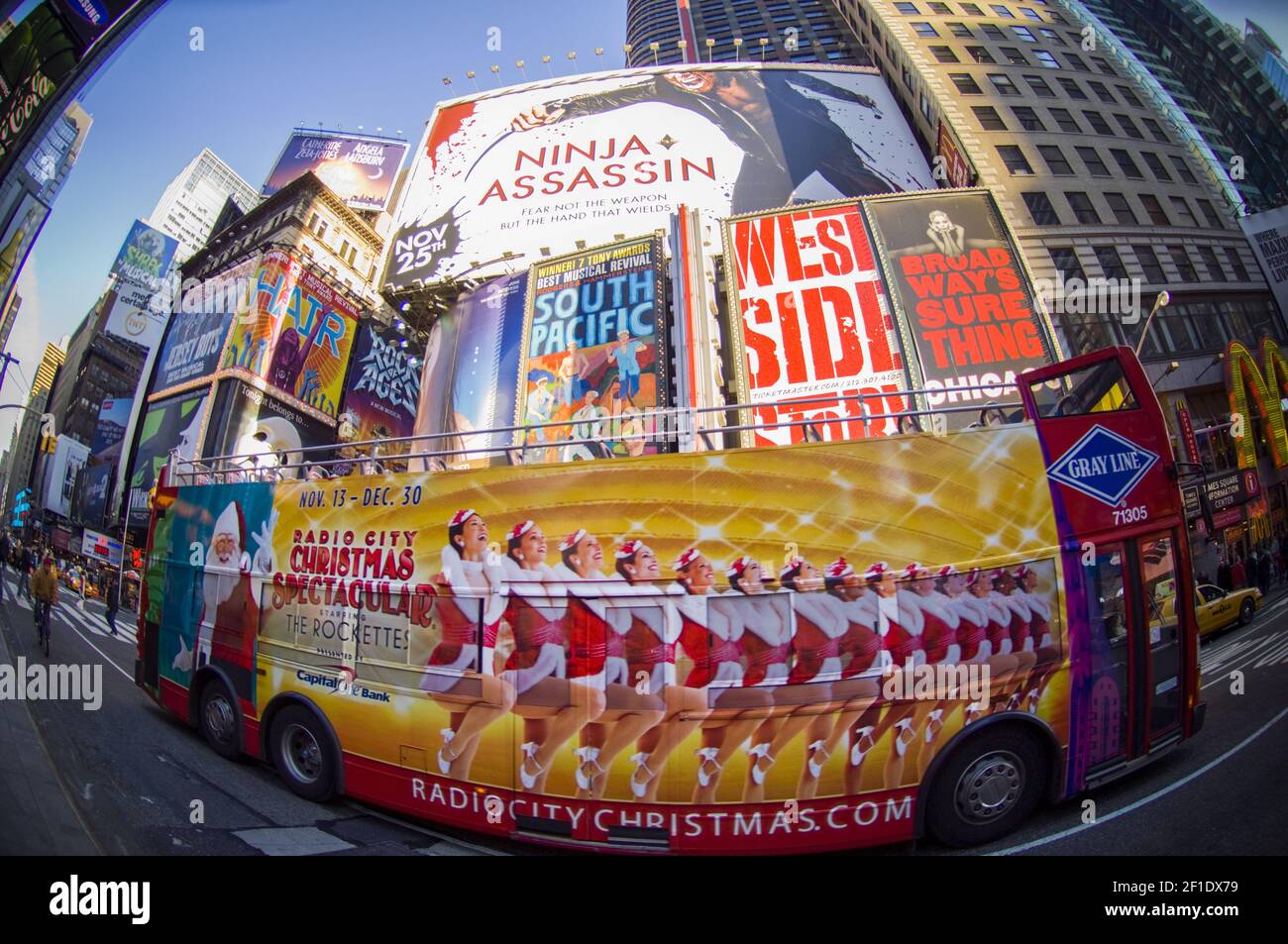 A tour bus advertises the Radio City Christmas Spectacular in Times Square  in New York on Friday, May 22, 2009. The Christmas Spectacular, featuring  The Rockettes dancers, has been canceled due to