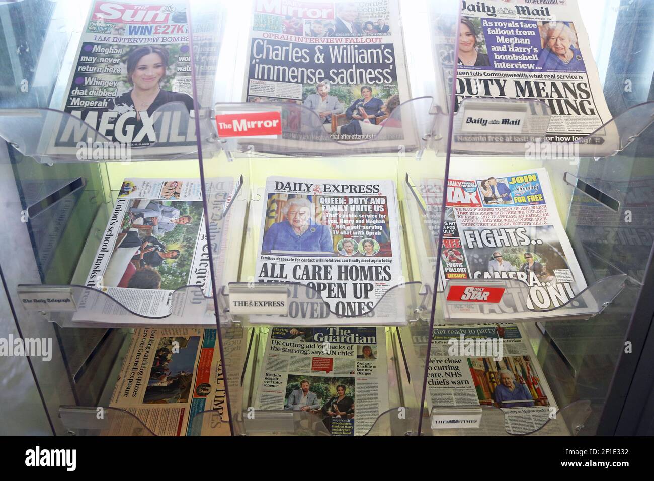 The front pages of newspapers on sale at a garage in Dover, Kent. The Duke and Duchess of Sussex have plunged the monarchy into a crisis, accusing an unnamed royal of racism, suggesting the family were jealous of Meghan and revealing that she contemplated taking her own life while pregnant. Picture date: Monday March 8, 2021. Stock Photo