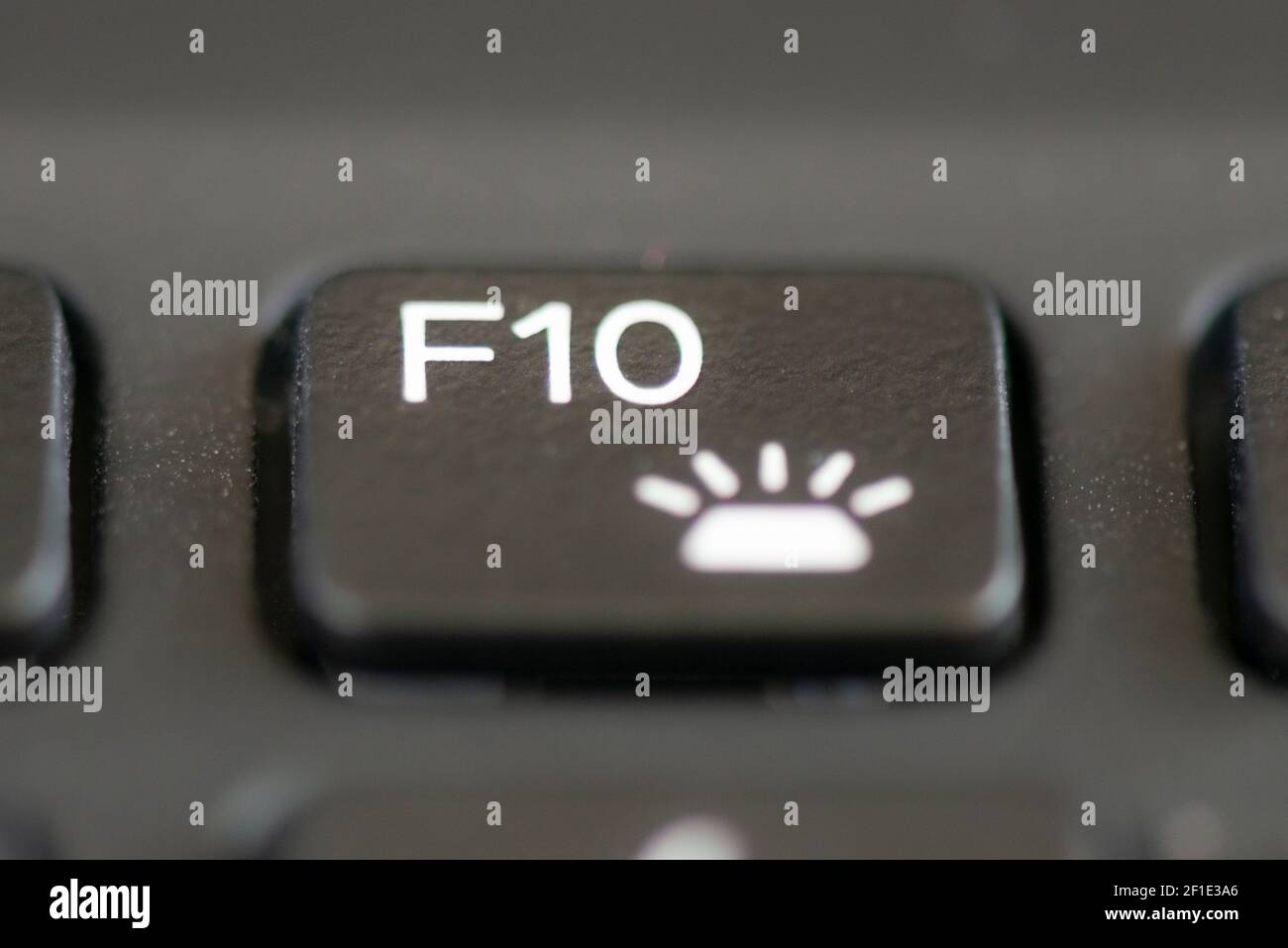F10 and keyboard backlight key on a laptop keyboard Stock Photo - Alamy