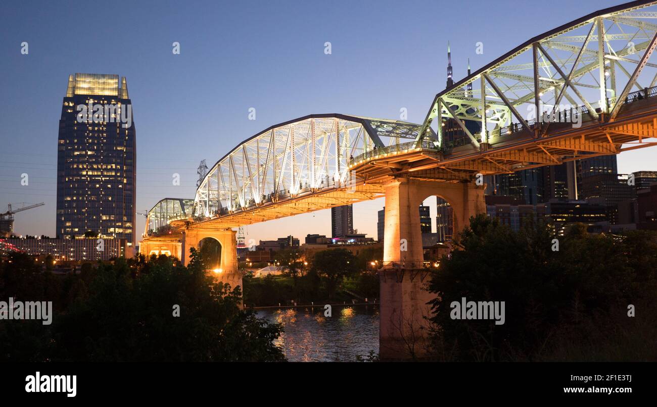 People Walk Across Cumberland River Pedestrian Bridge Nashville