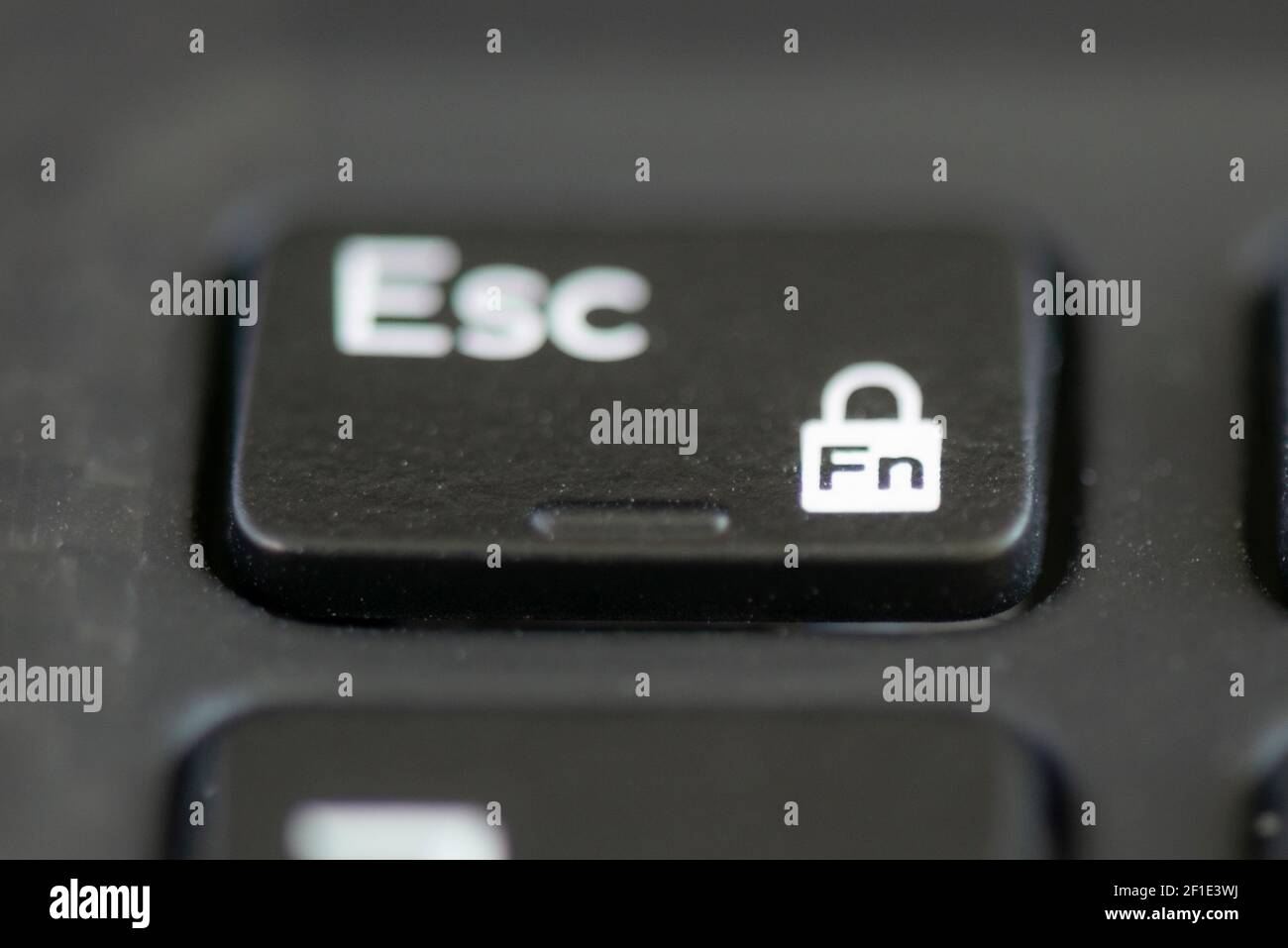 Escape and function lock key on a laptop keyboard Stock Photo