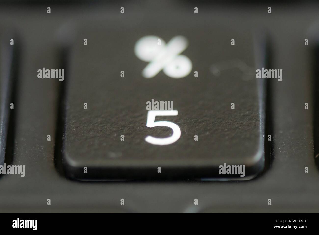 Number 5 and percentage key on a laptop keyboard Stock Photo