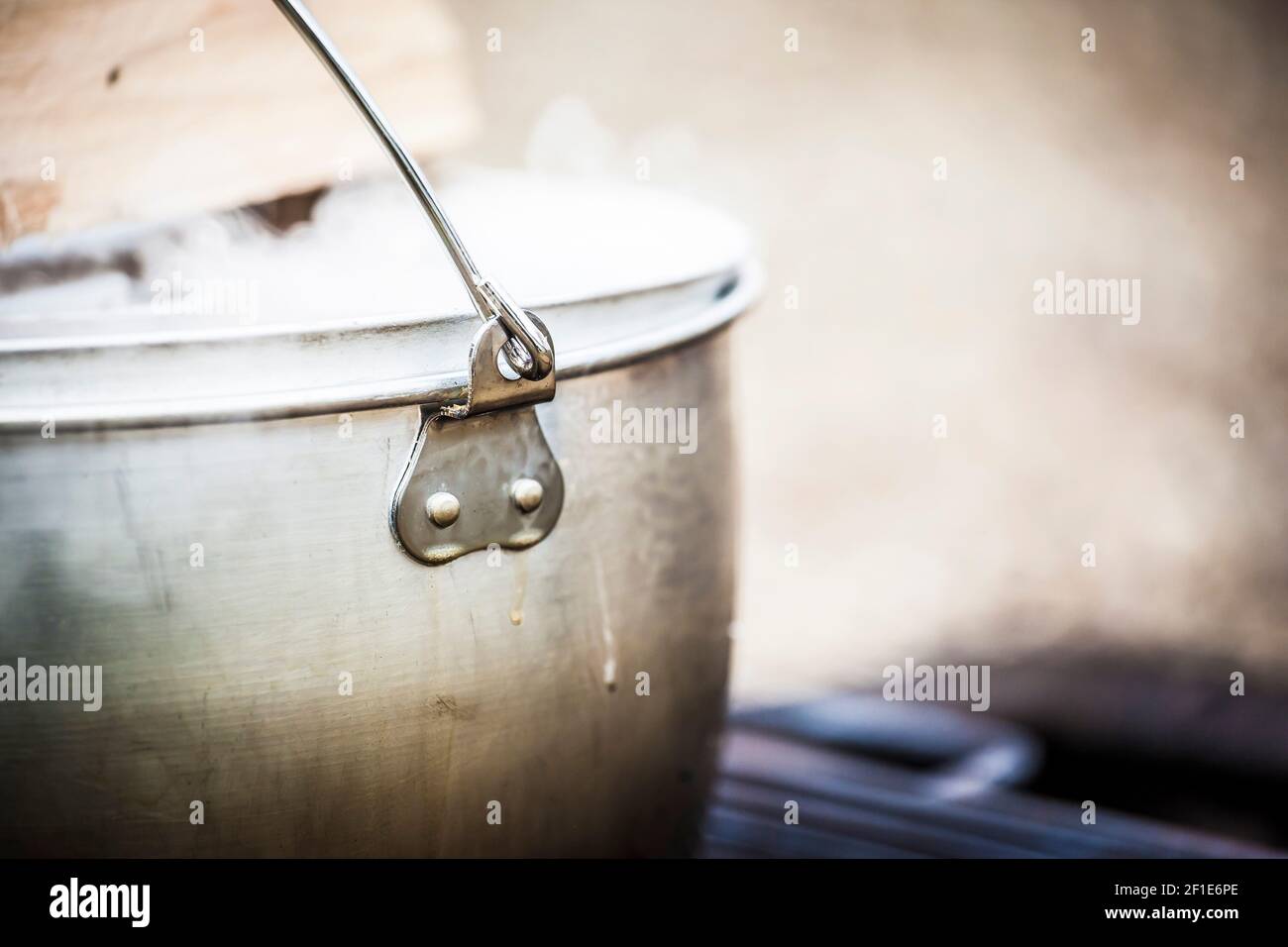 Cooking over open fire outdoors Stock Photo Alamy