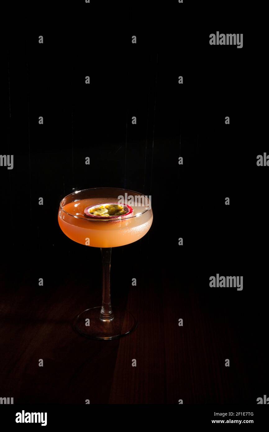 Dark Image of Passion Fruit Martini Stock Photo