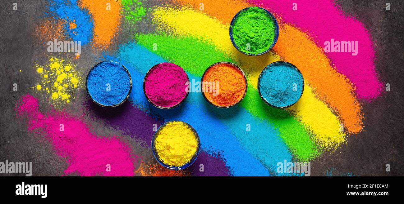 Holi colored paints. Holi traditional festival. Colorful powders in a bowl.  Top view, banner Stock Photo - Alamy