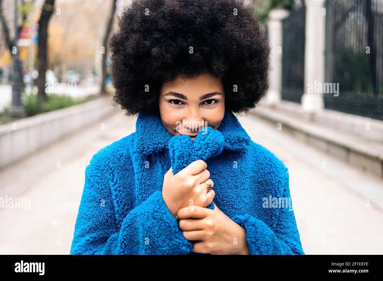 Stock photo of beautiful african american girl smiling and looking at ...