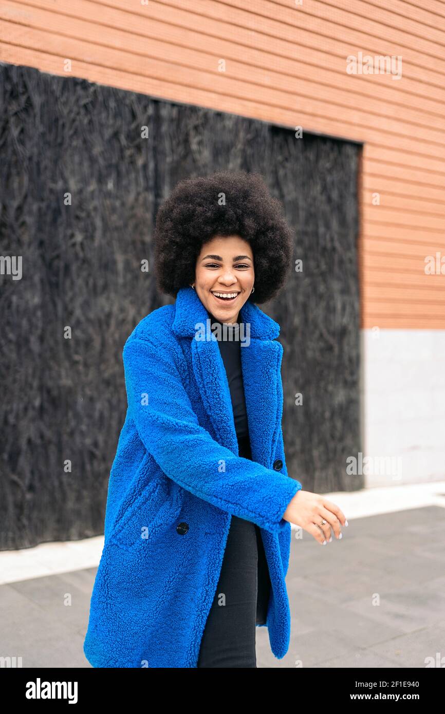 Stock photo of beautiful african american girl smiling and looking at ...