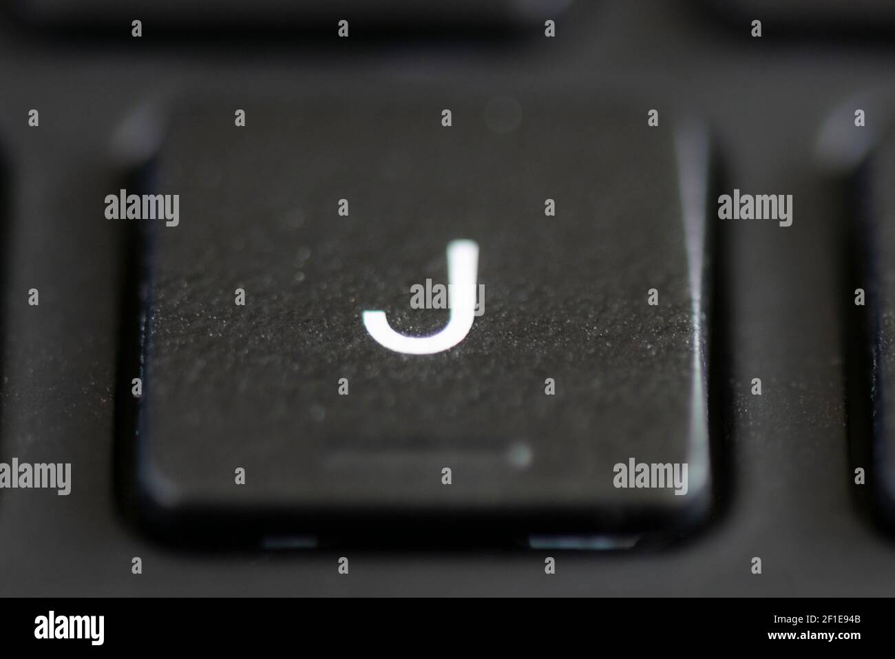 J key on a laptop keyboard Stock Photo - Alamy