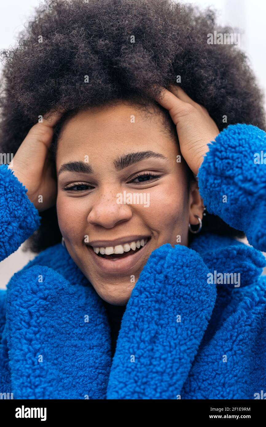 Stock photo of beautiful african american girl smiling and looking at ...