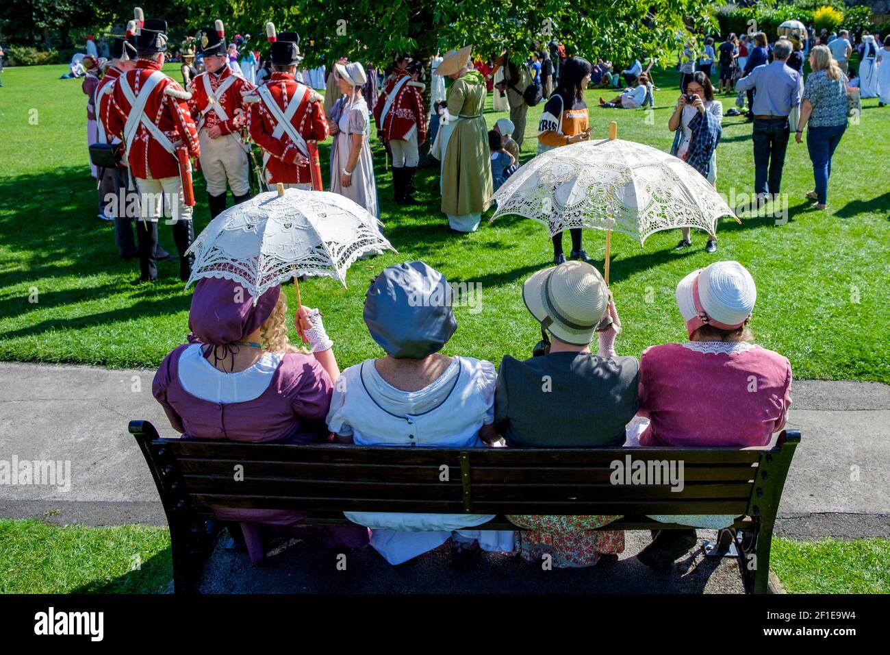 Bath, UK 14/09/2019 Jane Austen festival fans taking part in the world famous Grand Regency Costumed Promenade are pictured in Parade Gardens. Stock Photo