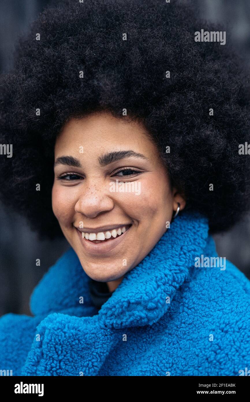 Stock photo of beautiful african american girl smiling and looking at ...