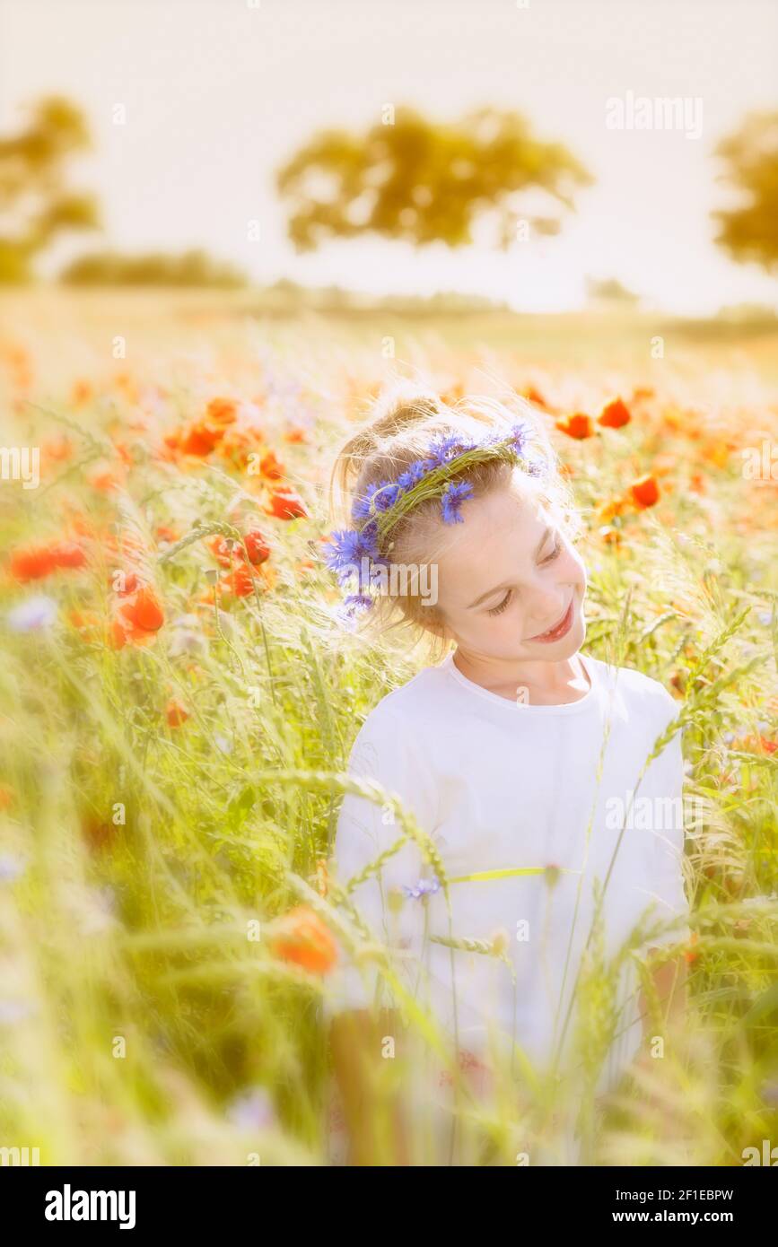 Girl with flower wreath at Midsummer Stock Photo