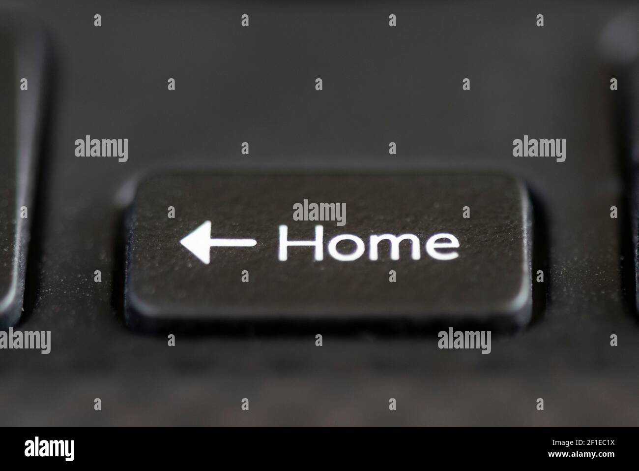 Left arrow and home key on a laptop keyboard Stock Photo Alamy
