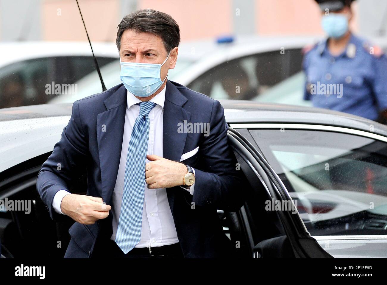 Giuseppe Conte President of the Council of Ministers of the Italian Republic wearing an anti-coronavirus mask, during a visit to the 'Francesco Gesuè' Stock Photo