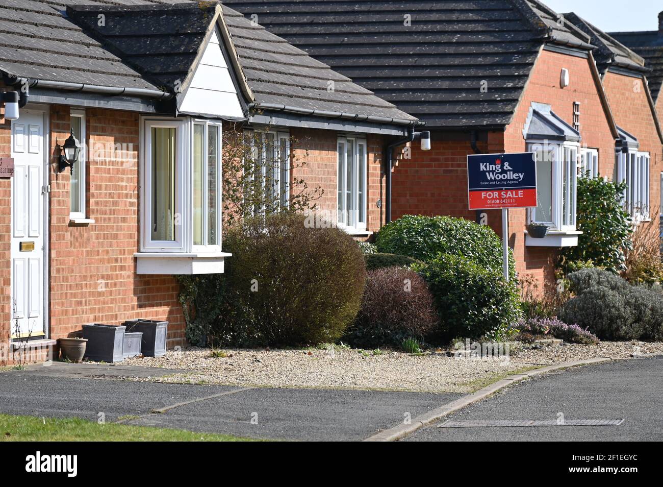 Estate Agent's For Sale sign outside a house in The Shearings in the
