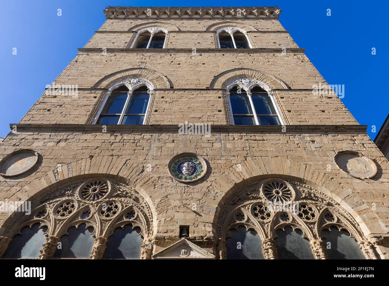 The church of Orsanmichele, formerly also known as the church of San Michele in Orto, is located in Florence and was originally a loggia built for the Stock Photo